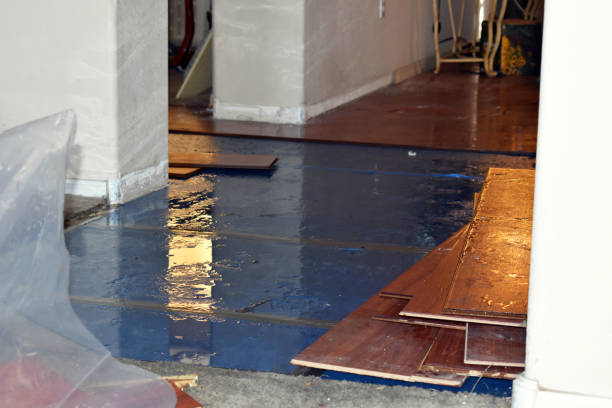Professional Flood Damage Restoration technician working in Aumsville, OR